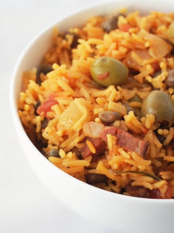 Arroz Con Gandules is a traditional Puerto Rican rice dish. Packed full of flavor, this makes for a unique side dish