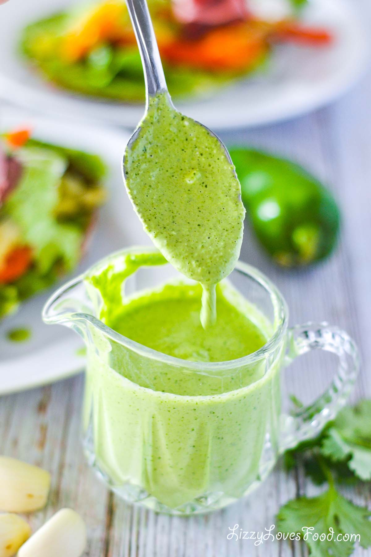 Peruvian Green Sauce with a dipped spoon