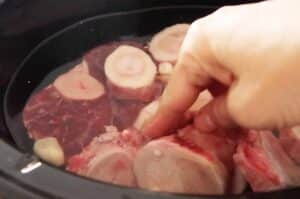 bones in the crockpot with water