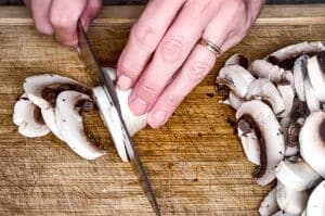 slicing mushrooms