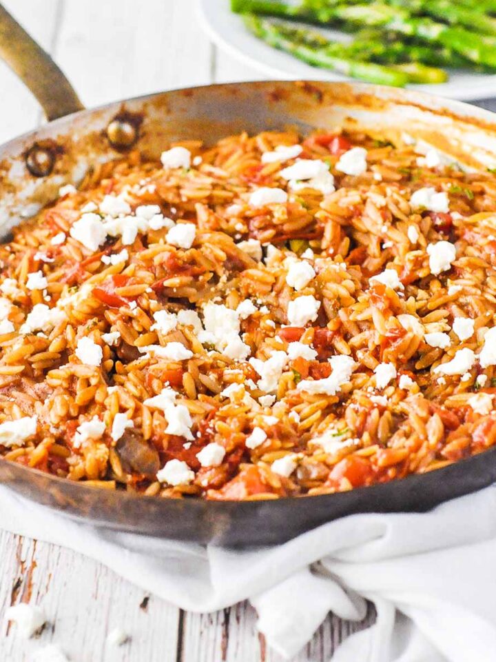 Manestra Creamy Tomato Orzo in a pan on the table