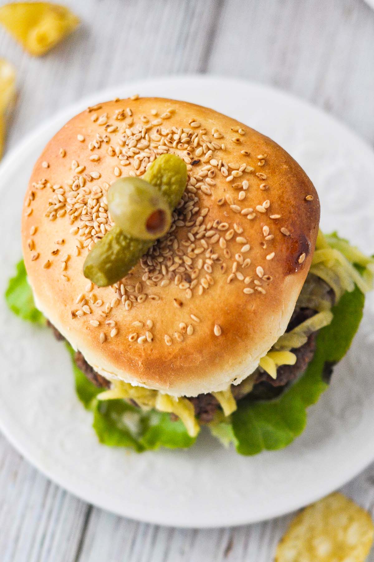 https://lizzylovesfood.com/wp-content/uploads/2023/04/Sesame-Seed-Bun-Burger-5.jpg